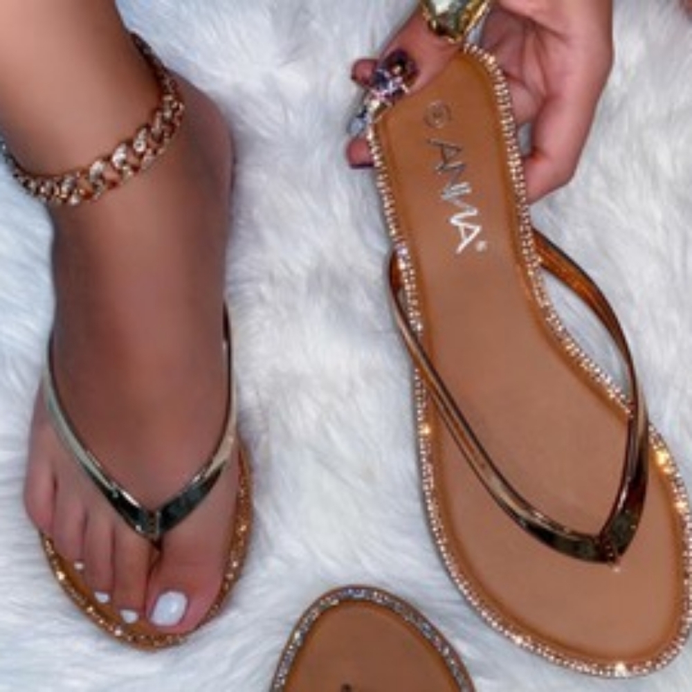Rose gold flip flops